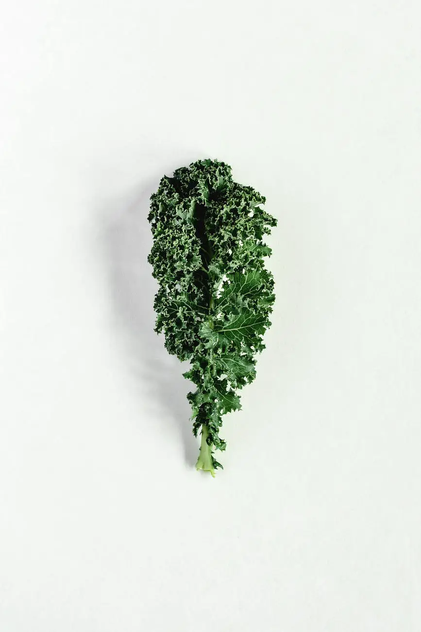 close up shot of a kale on a white surface